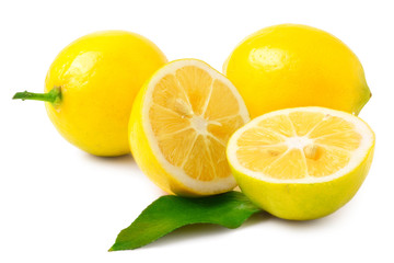 two half lemons and whole on a white background