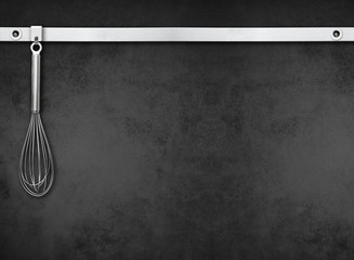 Metal rail with kitchen tools