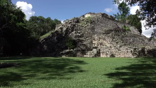 Costa Maya Mexico Kohunlich Mayan Ruins Temple building 4K. Archaeological pre Columbian civilization. Pyramids, courtyards, palace and temple. 200 BC. Temple of the Masks. Despain of Rekindle Photo.