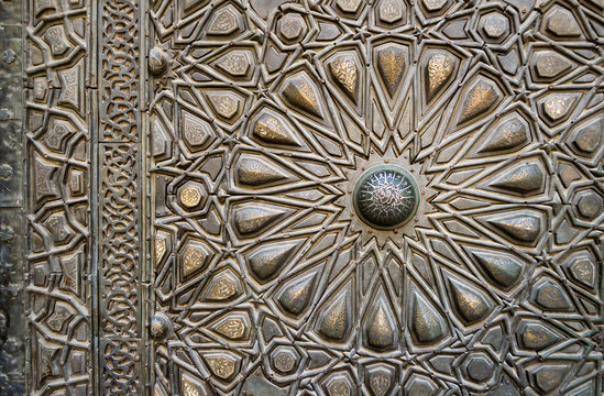 Ornaments of the bronze-plate door of an old mosque, Old Cairo,