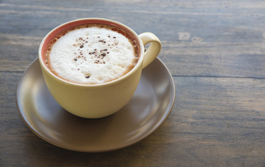 hot coffee on wood table