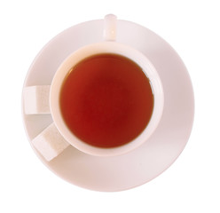 White Cup of tea, saucer, sugar cubes, on a white background
