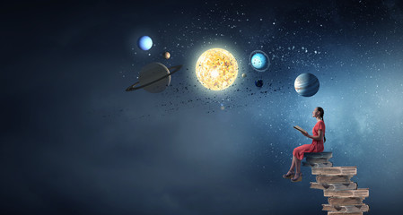 Woman in dress with book