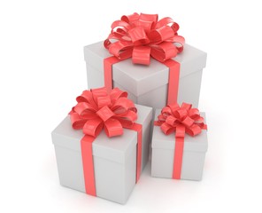 three gift boxes with bows isolated on white