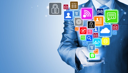 Business man using smart phone with social media icon set