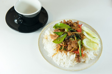 Fried spicy  boar pattern thailand food style with black cup , i