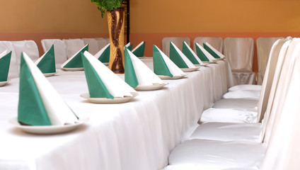 plates on table in restaurant - food background