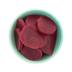 Sliced beets in a green bowl