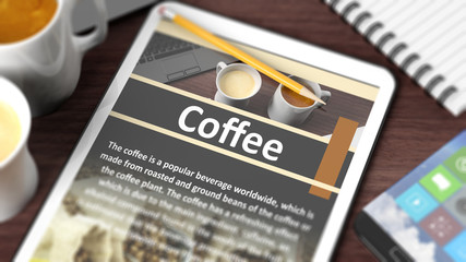 Tabletop with various objects focused on tablet with  "Coffee" content on screen