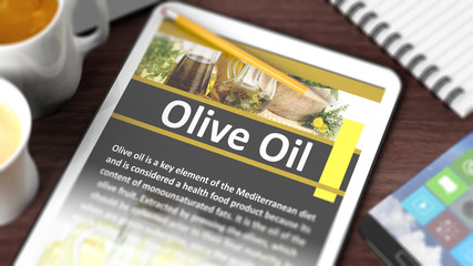 Tabletop with various objects focused on tablet with "Olive Oil"  content on screen