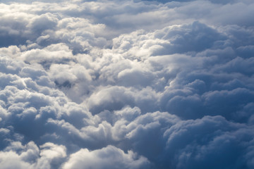 Obraz na płótnie Canvas Fluffy storm clouds, aerial photography.