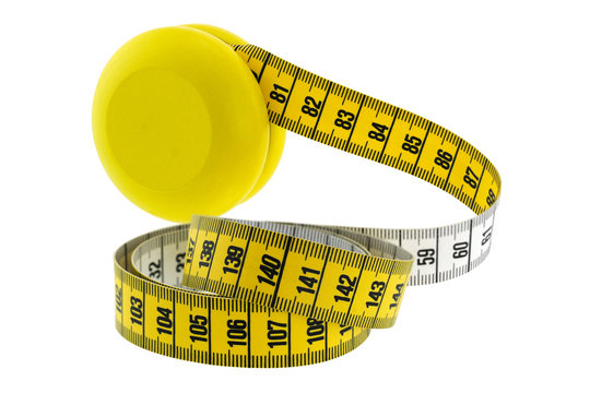 A wooden yellow YoYo with yellow measuring tape, isolated on white represent the idea of Yo-Yo dieting Effect 