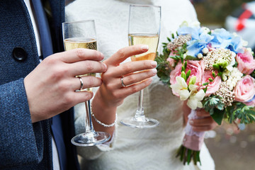 Bride and groom with champagne glasses