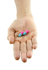 pills capsule on hand outstretched