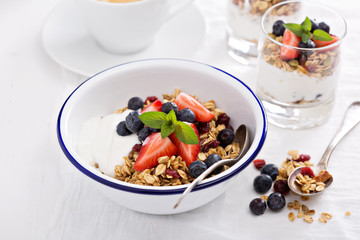 Granola with fresh berries in a bowl