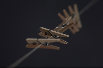 Fototapeta na wymiar wooden clothespins on a rope