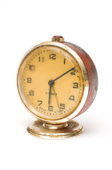 Old mechanical alarm clock on white background