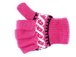 close up pink winter glove gesturing thumb up for like sign isolated on white background