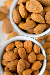 almonds on wooden surface