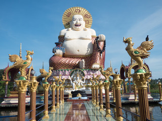 Wat Plai Laem laughing buddha Thailand sightseeing