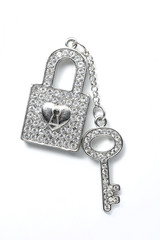 brooch key and lock isolated on white