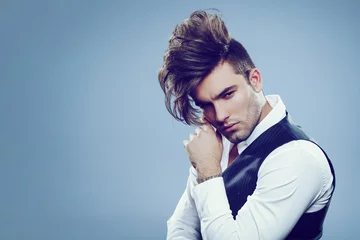 Peel and stick wall murals Hairdressers Handsome man with modern hairstyle in studio