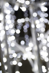 Obraz premium White circles on a dark background 