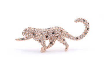 Fototapeta premium brooch leopard on a white background