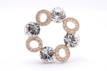 gold brooch with diamonds