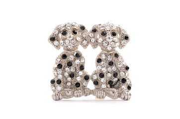 brooch in the form of a dog on a white background