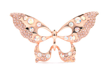 Fototapeta premium Brooch in the form of a golden butterfly on a white background