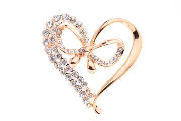 brooch in the form of heart on a white background