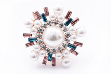 brooch in the shape of snowflakes  on a white background