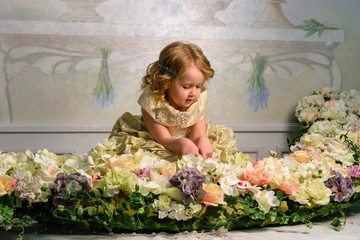 Little girl in dress with flowers