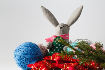 Handmade felt toy with colored wool clew