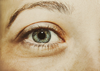 Beautiful insightful look blue woman's eyes