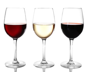 Different kinds of wine in gasses on light background