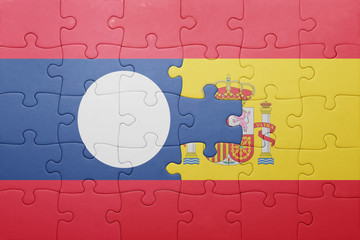 puzzle with the national flag of spain and laos