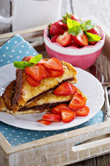 French toasts with chocolate spread and strawberry