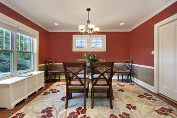 Dining room with orange walls