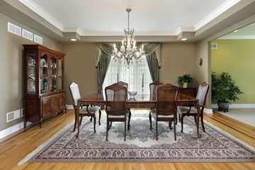 Dining room with large carpet