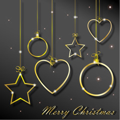 anelli dorati a forma di palline, cuori ed stelle con iscrizione "Merry Christmas