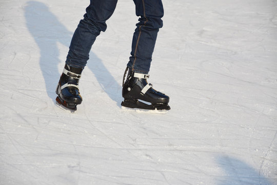 Young male ice skating