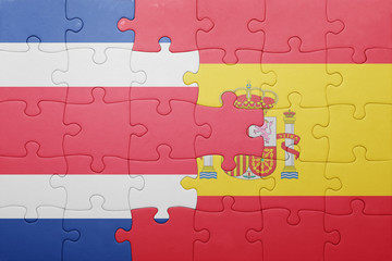 puzzle with the national flag of spain and costa rica