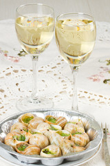 White wine and grape snails