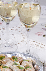 White wine and grape snails