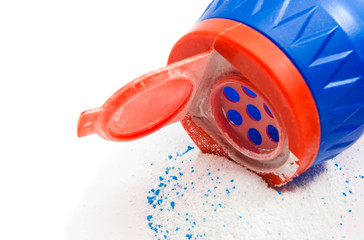 blue bottle with powder on white