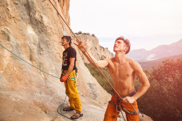 Two rock climbers on the cliff