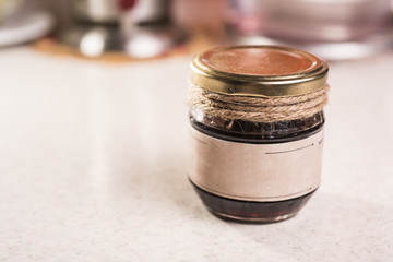 Small jar of jam close up.