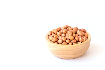 Close up raw peanuts on white